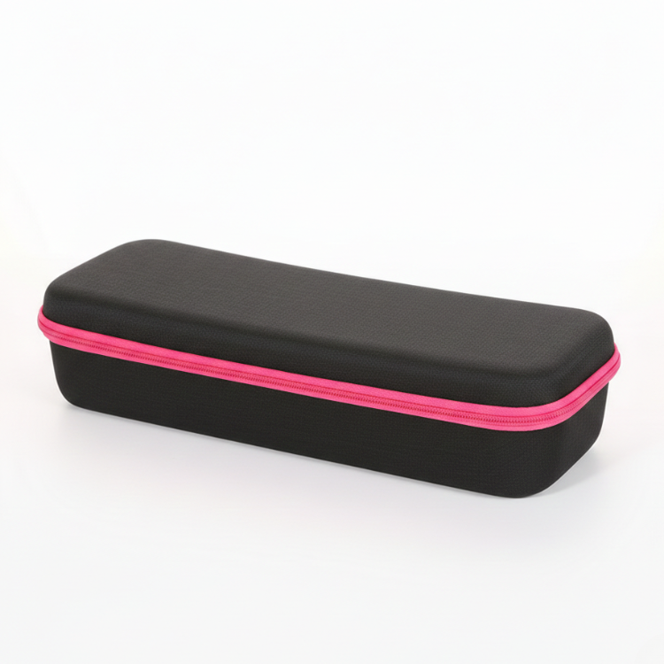 RosyIron hard steamer case lying flat, black shell with bright pink zipper trim