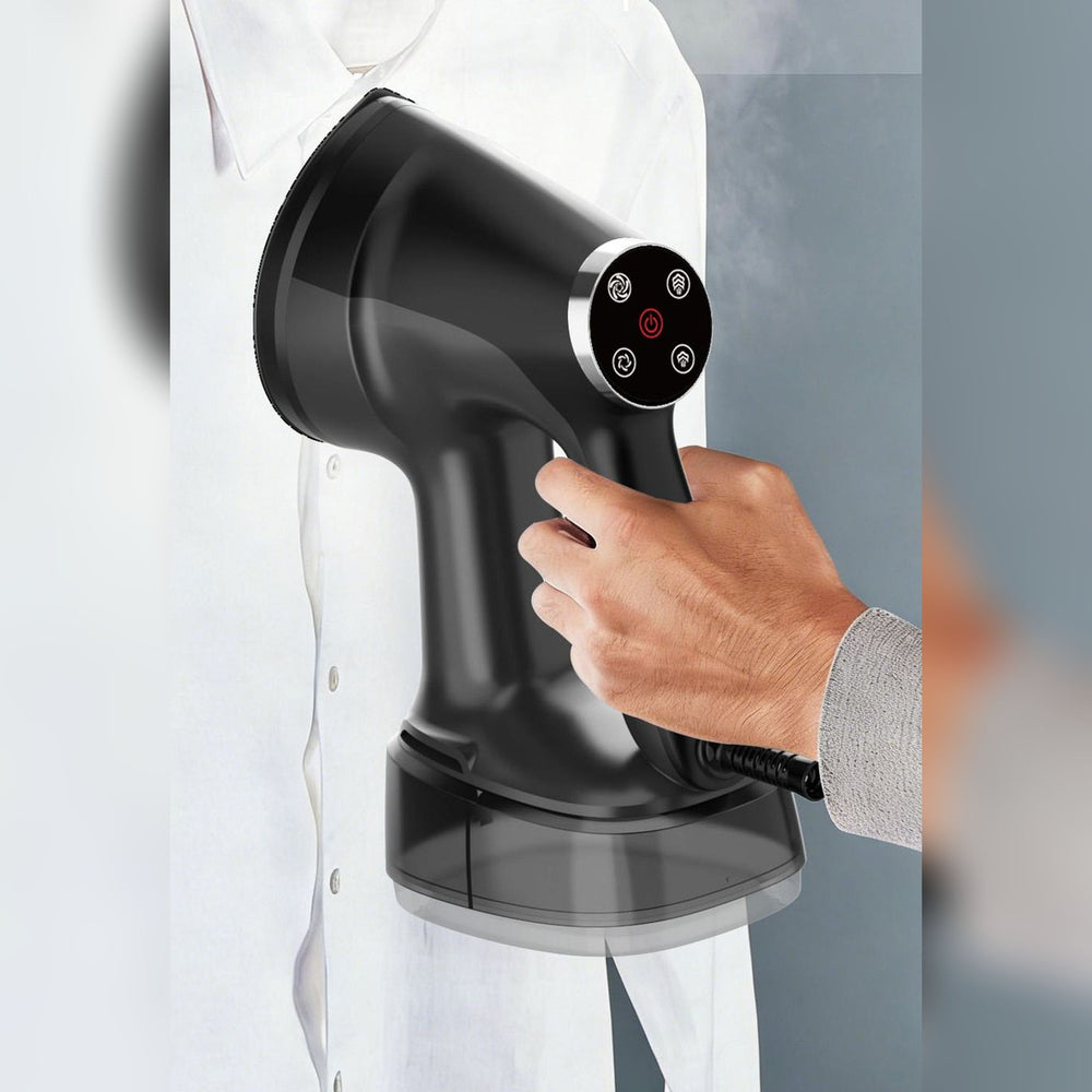 RosyIron handheld suction garment steamer in black steaming a white shirt on a hanger