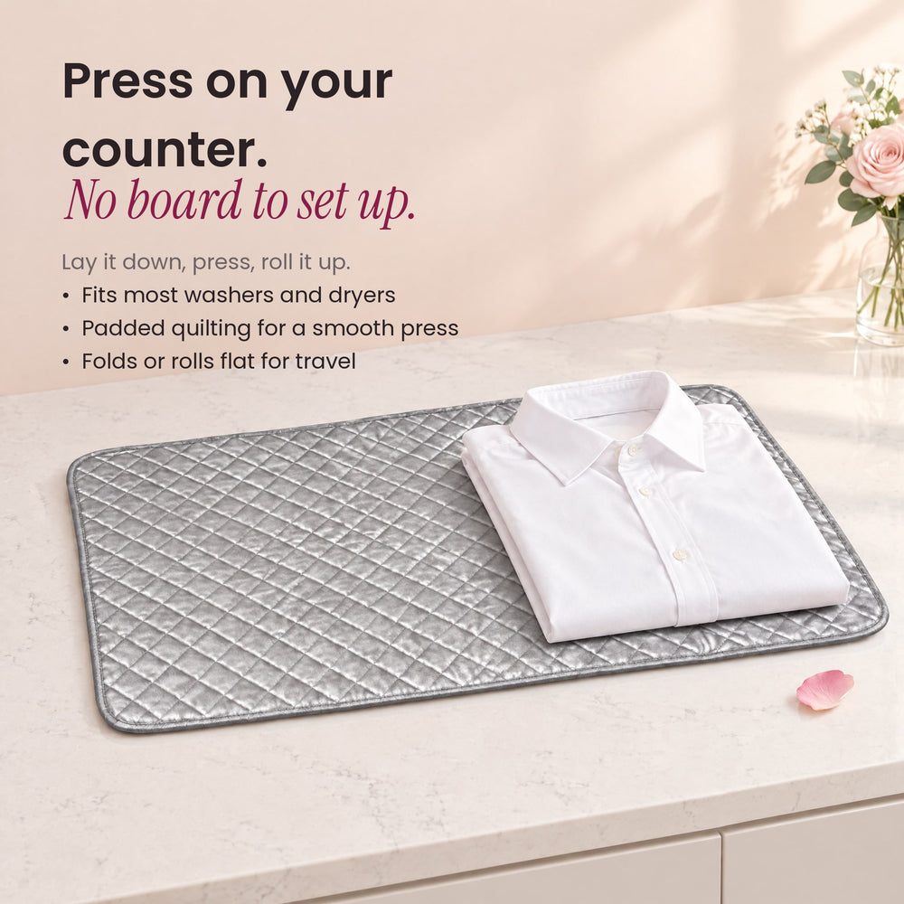 RosyIron magnetic ironing mat on a table with a folded white shirt, turning it into a pressing surface