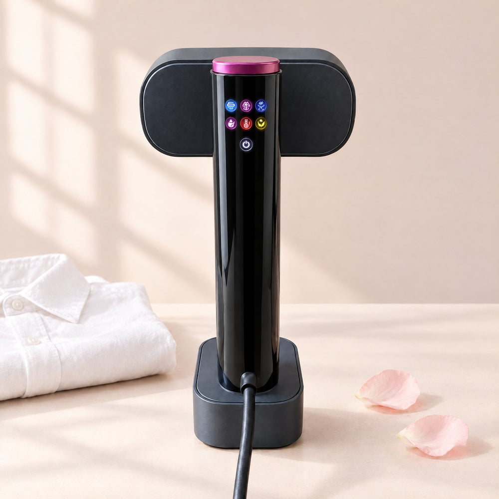 RosyIron SteamStand 2-in-1 standing steamer in black with magenta cap and glowing touch panel on a blush table