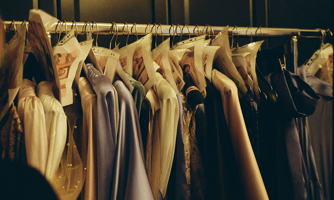 Silk and satin dresses hanging on a clothes rail