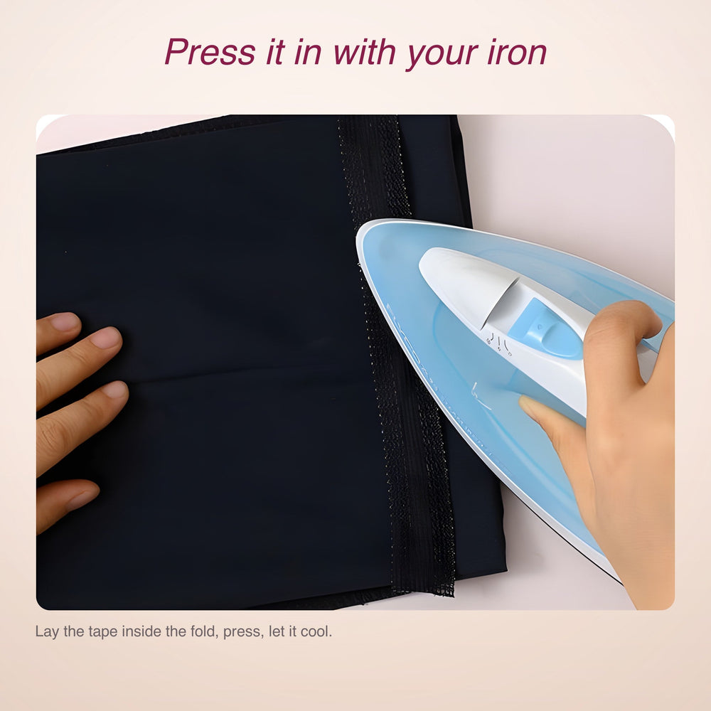 RosyIron no-sew hem tape being pressed into a navy trouser hem with a household iron