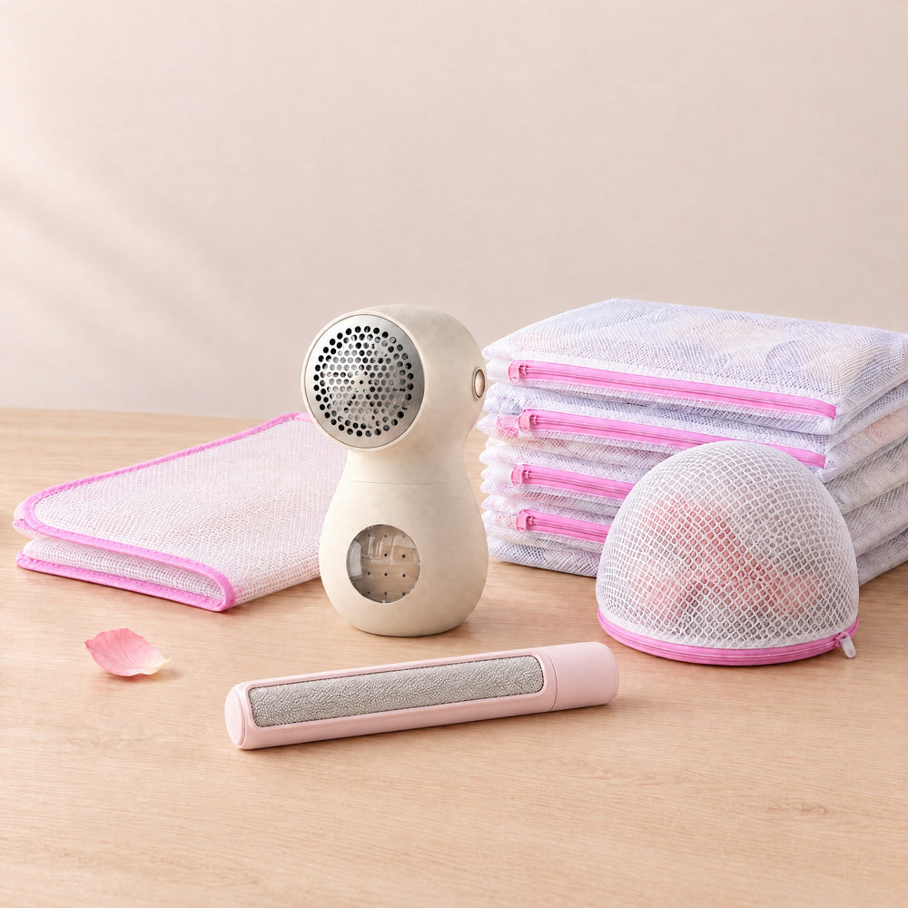 RosyIron Fabric Care Kit with fabric shaver, pink lint brush, mesh laundry bags and mesh pressing cloth