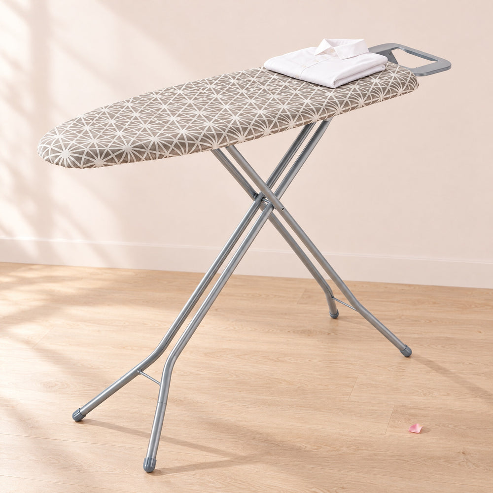 RosyIron full-size ironing board with grey geometric cover and iron rest, a folded white shirt on top
