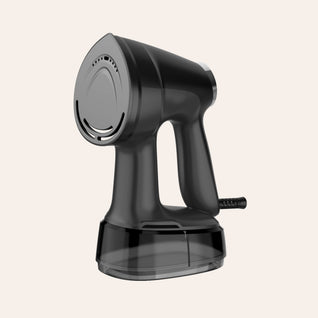 RosyIron handheld suction garment steamer in black, side view of the steam plate and water tank