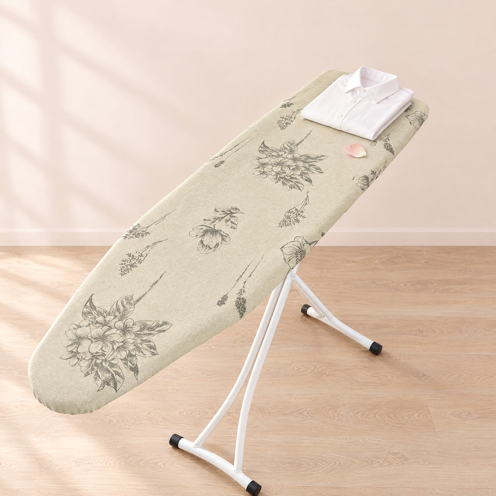 RosyIron canvas ironing board cover in Little Bee Flower print on a board with a folded white shirt