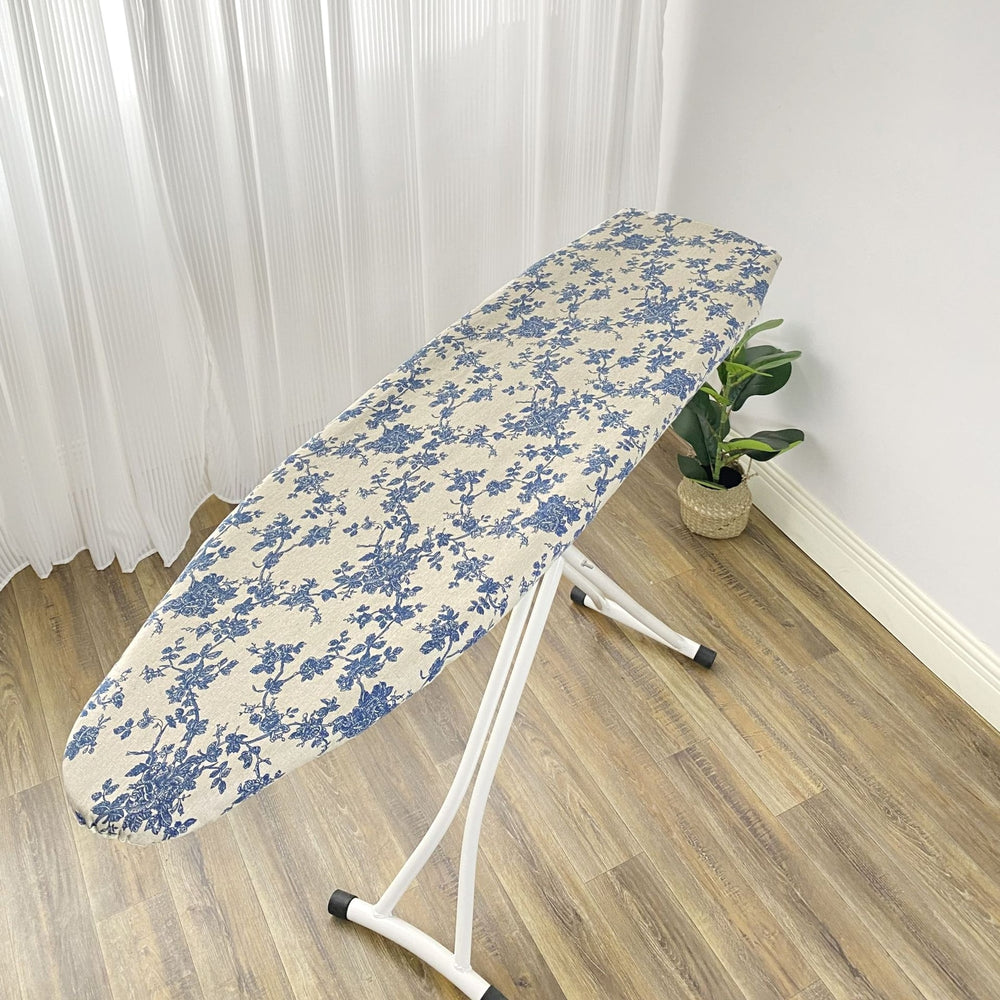 RosyIron padded canvas ironing board cover in Blue Rose print fitted on an ironing board