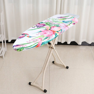RosyIron floral ironing board cover with pink irises and a hummingbird fitted on an ironing board