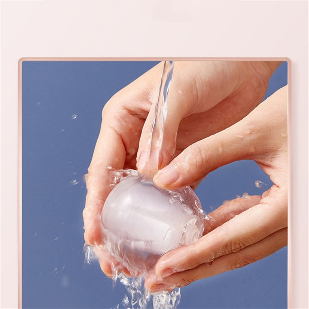 RosyIron washable gel lint roller core being rinsed under running water to refresh its sticky grip