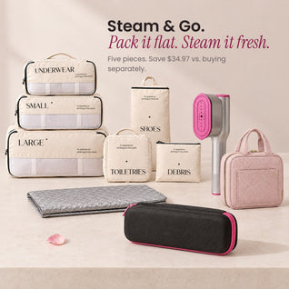 RosyIron Steam & Go Travel Set on a table: six packing cubes, folded ironing mat, travel case, SteamerPro and pink toiletry bag