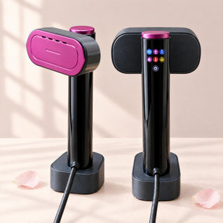 Two RosyIron SteamStand steamers, one turned to show the magenta steam plate, one showing the touch panel