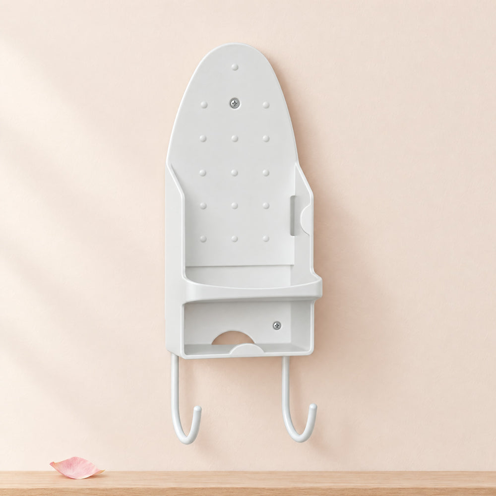 RosyIron wall-mount iron and ironing board holder in white on a blush wall with two coated hooks